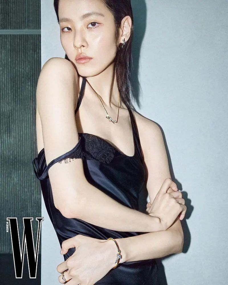 Model Song Ah Woo wearing a black satin dress and jewellery for W Korea Traces of Light editorial