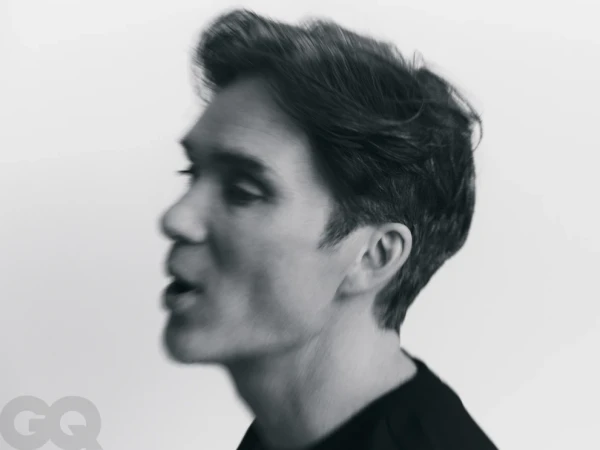 Profile portrait of actor Cillian Murphy with motion blur against a white background for GQ Poland