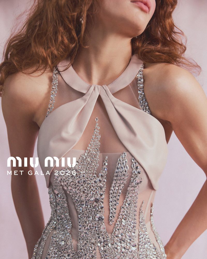 Close-up of Joey King wearing an embellished Miu Miu halter dress with crystal embroidery and sheer mesh panels.