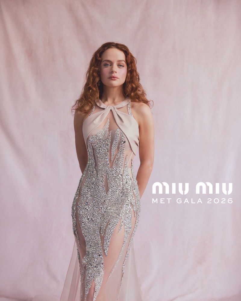 Joey King in a beaded halter gown for Miu Miu featuring text overlay against a neutral textured backdrop.