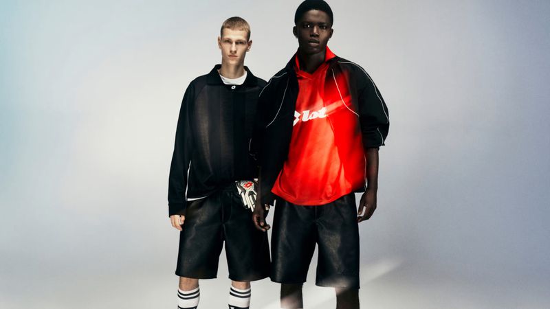 Two male models posing against a white studio background wearing athletic sportswear apparel for H and M and Lotto.