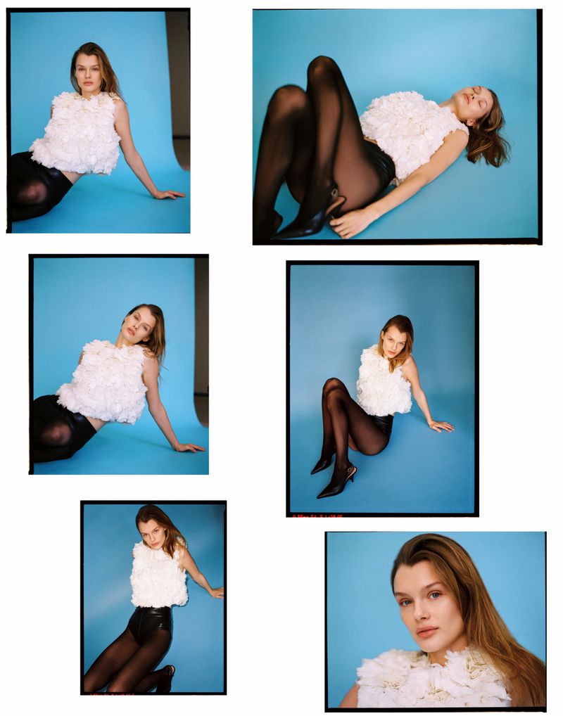 Contact sheet of fashion photographs featuring model Kris Grikaite wearing a white textured top against a bright blue seamless backdrop.