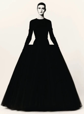 Model in a structured black ballgown wearing a dark cap against a plain white background