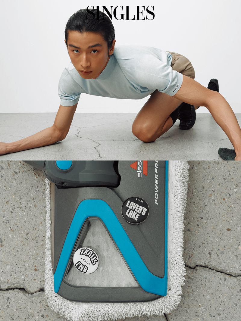 Model Yugo Takano crouching on a concrete studio floor above a close-up of a floor mop head for Singles Magazine.