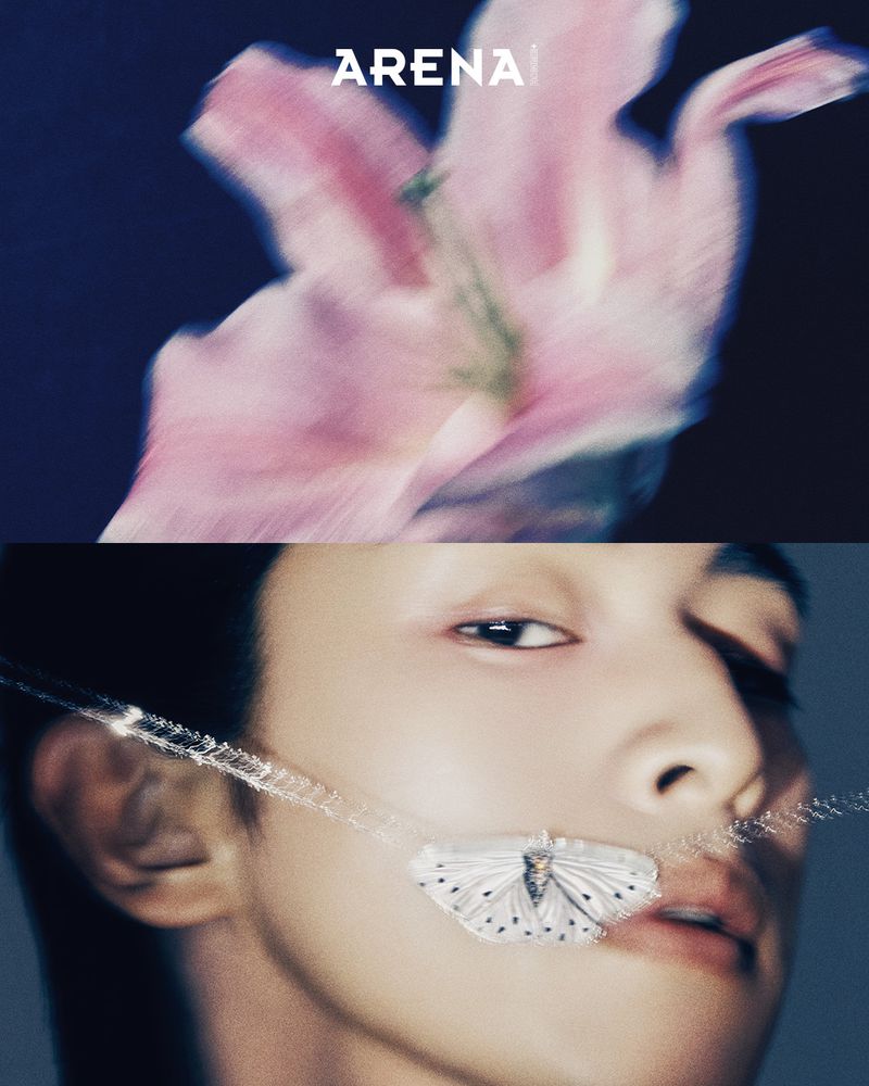 Close-up portrait of a male model wearing a delicate silver butterfly necklace held against his face for Arena Homme Plus Korea