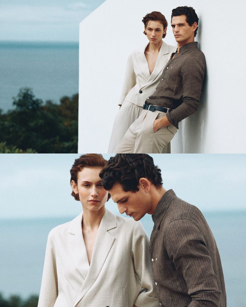 Two models leaning against a white wall outdoors with a coastal background for Pedro del Hierro.