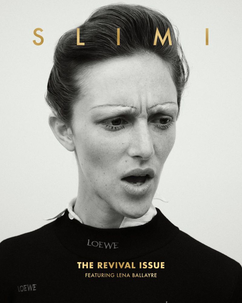 Magazine cover featuring close-up portrait of a woman with a serious expression, wearing a dark top, against a light background.