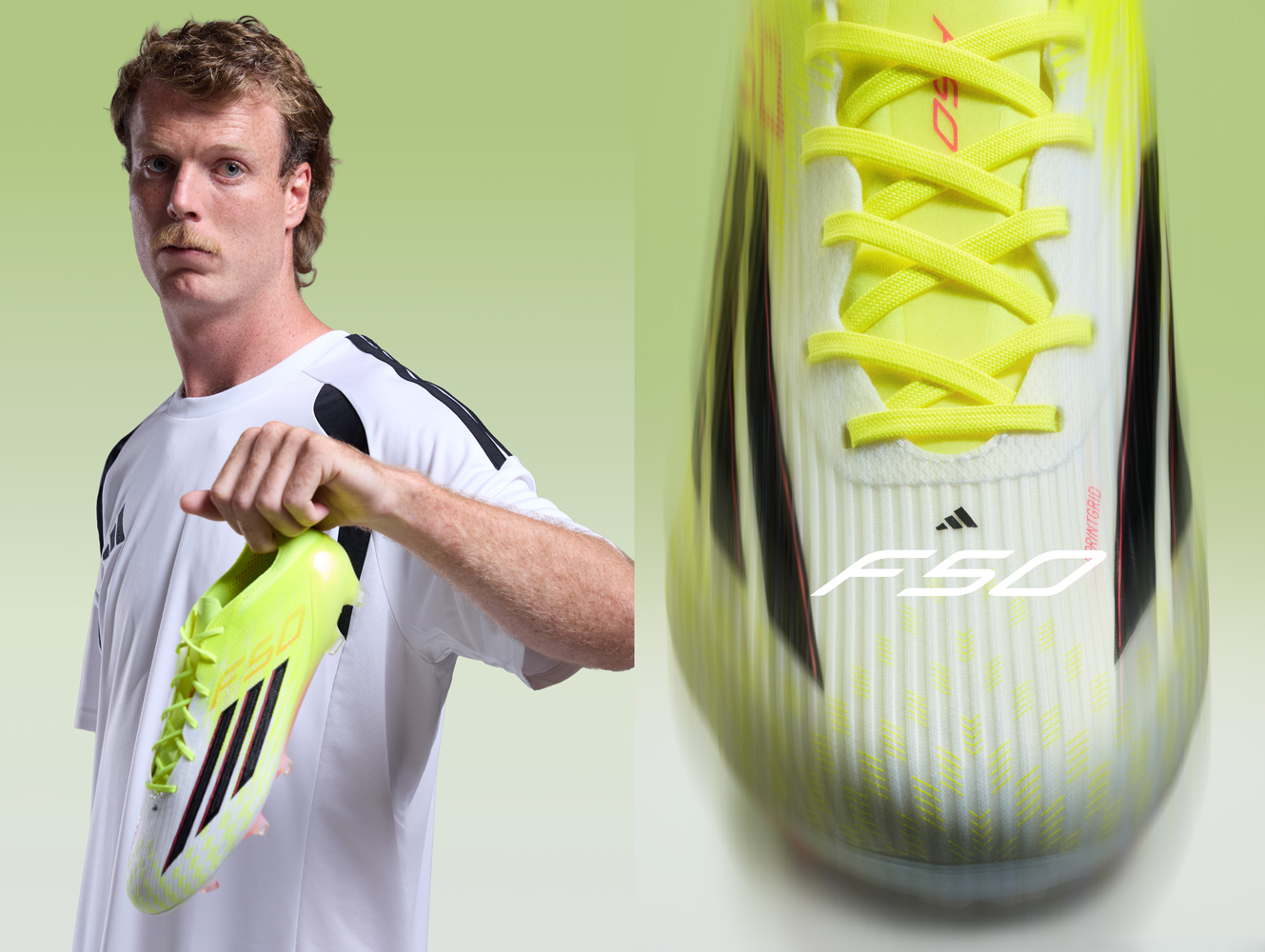 Man with reddish-brown hair holding up a yellow Adidas F50 football boot in a studio setting with a light green background.
