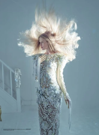 Model Maria Klaumann in an embellished white gown with flowing blonde hair in V Magazine Enlighten editorial by Nick Knight
