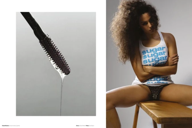 Close-up macro of a mascara wand dripping liquid alongside a seated woman wearing a printed tank top in an editorial layout.