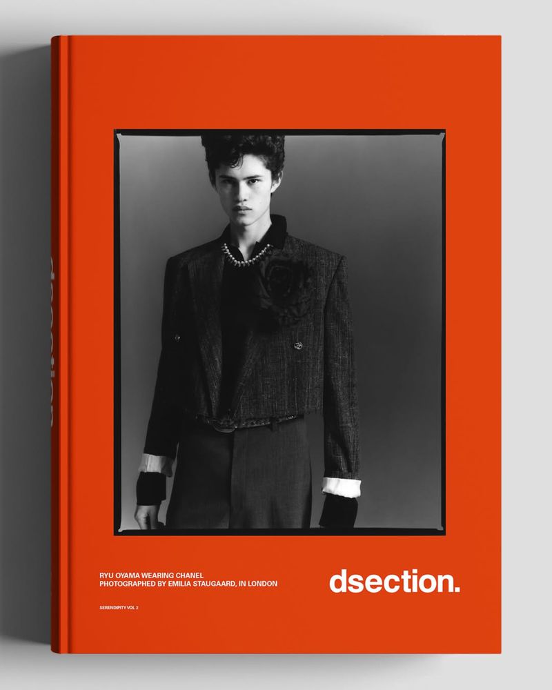 Orange DSECTION Magazine Serendipity cover featuring a black-and-white portrait of model Ryu Oyama wearing a Chanel jacket.