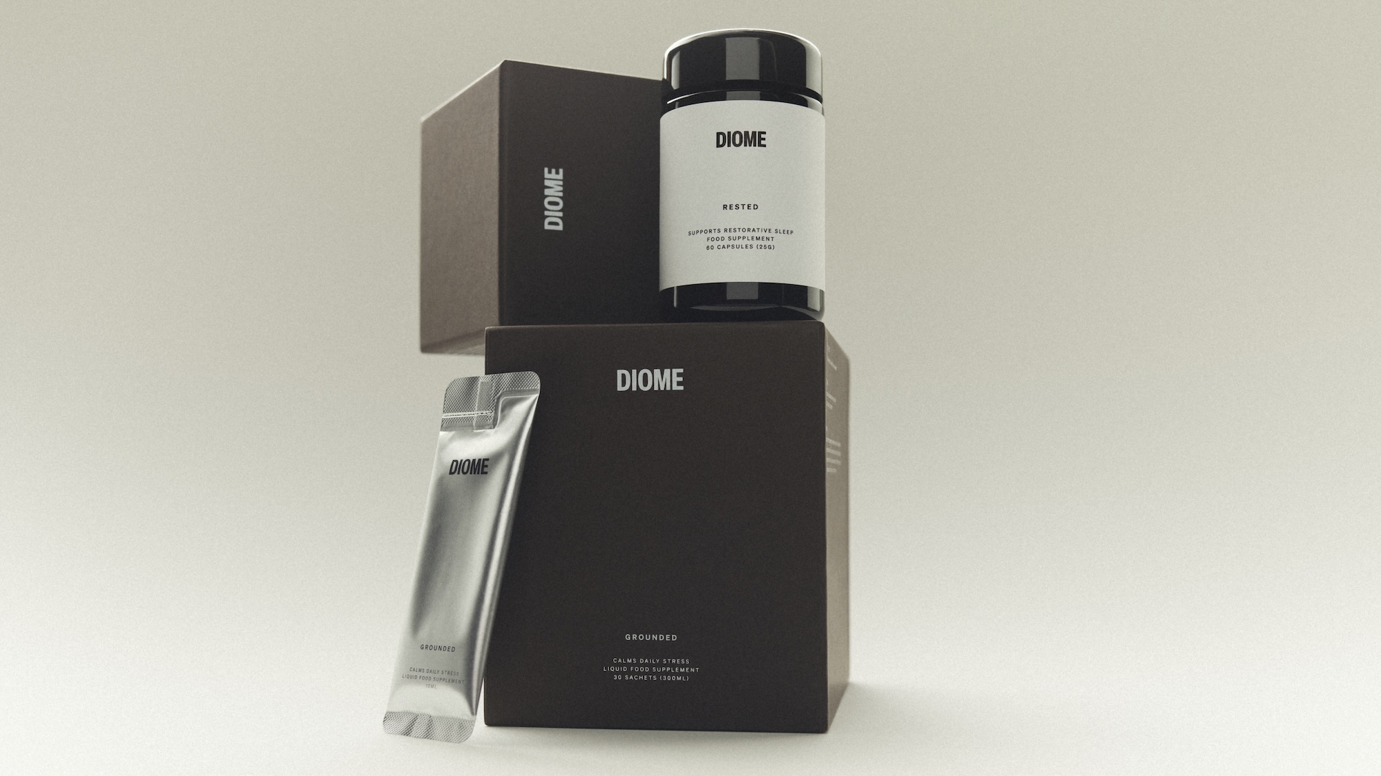 Diome supplement packaging featuring a dark capsule jar, liquid supplement sachet, and branded brown boxes on a light seamless backdrop.