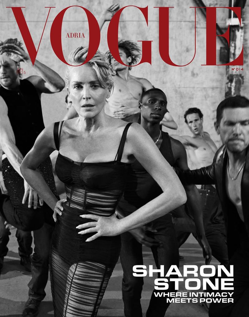 Vogue cover featuring Sharon Stone in a black dress, surrounded by a group of male dancers in an urban setting, vintage aesthetic.