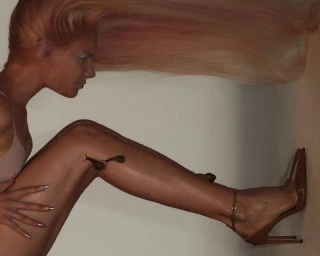 Woman in stiletto heels with long flowing hair and live snails crawling on her bare leg against a neutral studio backdrop.