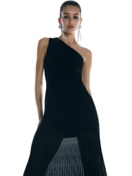 Model wearing a black one-shoulder dress and statement earrings against a bright white background for Witchery After Hours