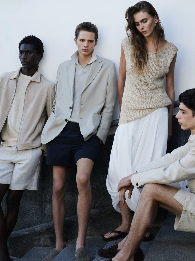Group of models posing outdoors wearing neutral-toned apparel for Massimo Dutti photographed by Bruno Staub