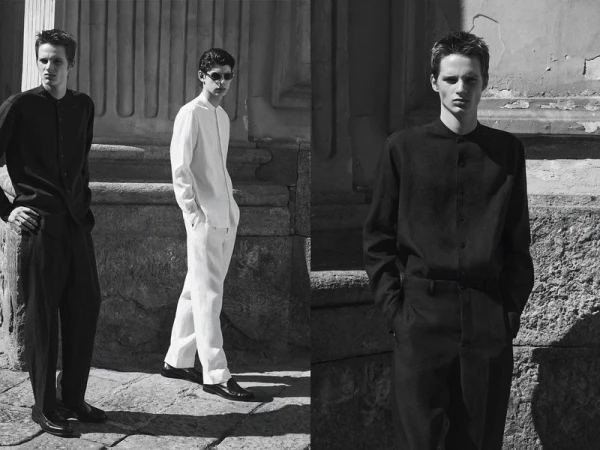 Black and white diptych of male models wearing monochrome black and white tailored shirts against stone architecture.