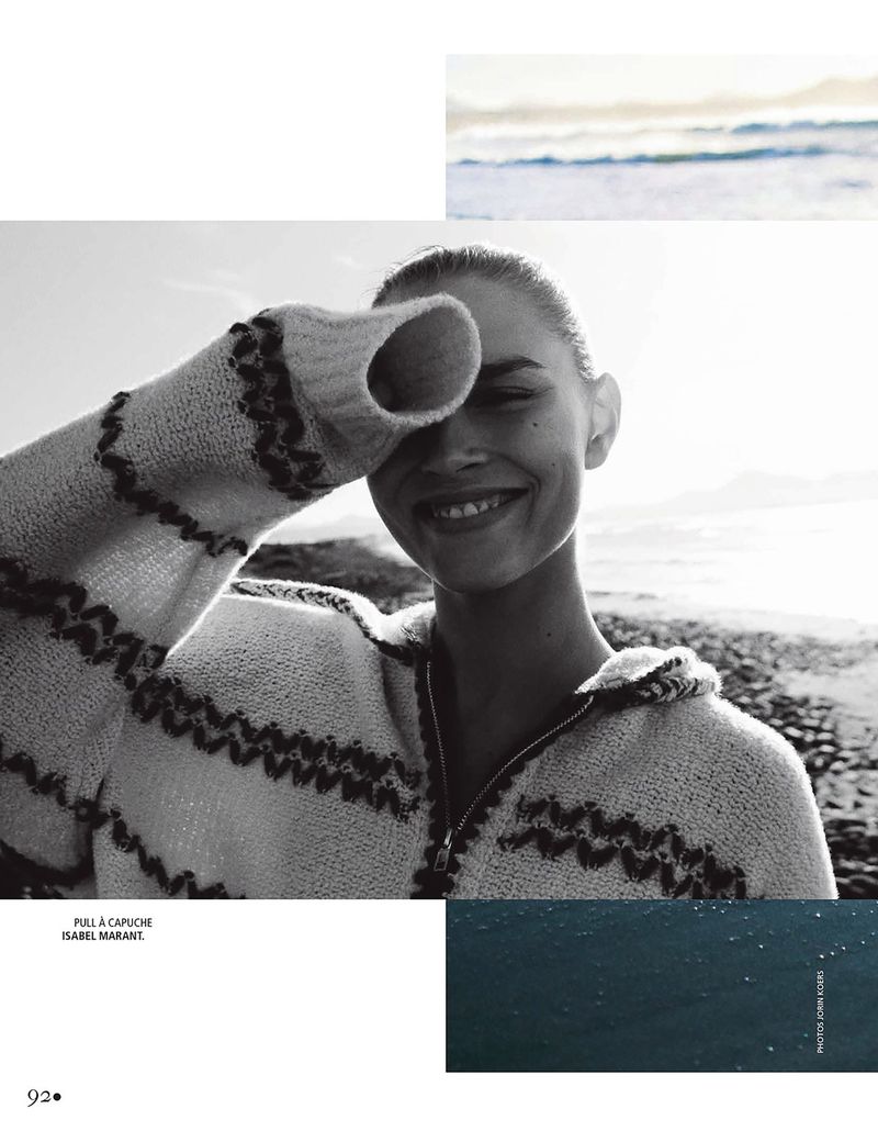 Black and white editorial portrait of model Olivia Aarnio in a knit hoodie smiling on a beach beside ocean image inserts.