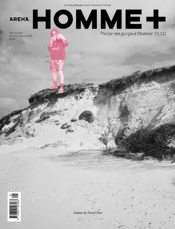 Arena Homme+ magazine cover featuring a bright pink silhouette figure atop a black and white coastal sand dune cliff.