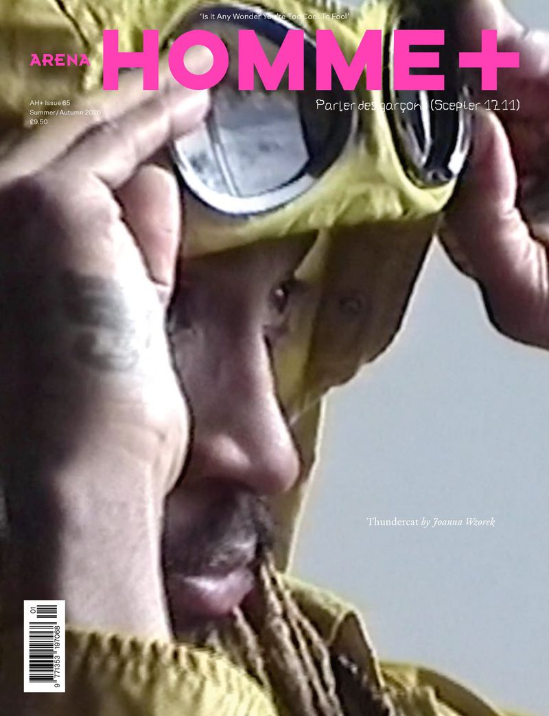 Musician Thundercat wearing a yellow goggle hood jacket on the cover of Arena Homme+ magazine.