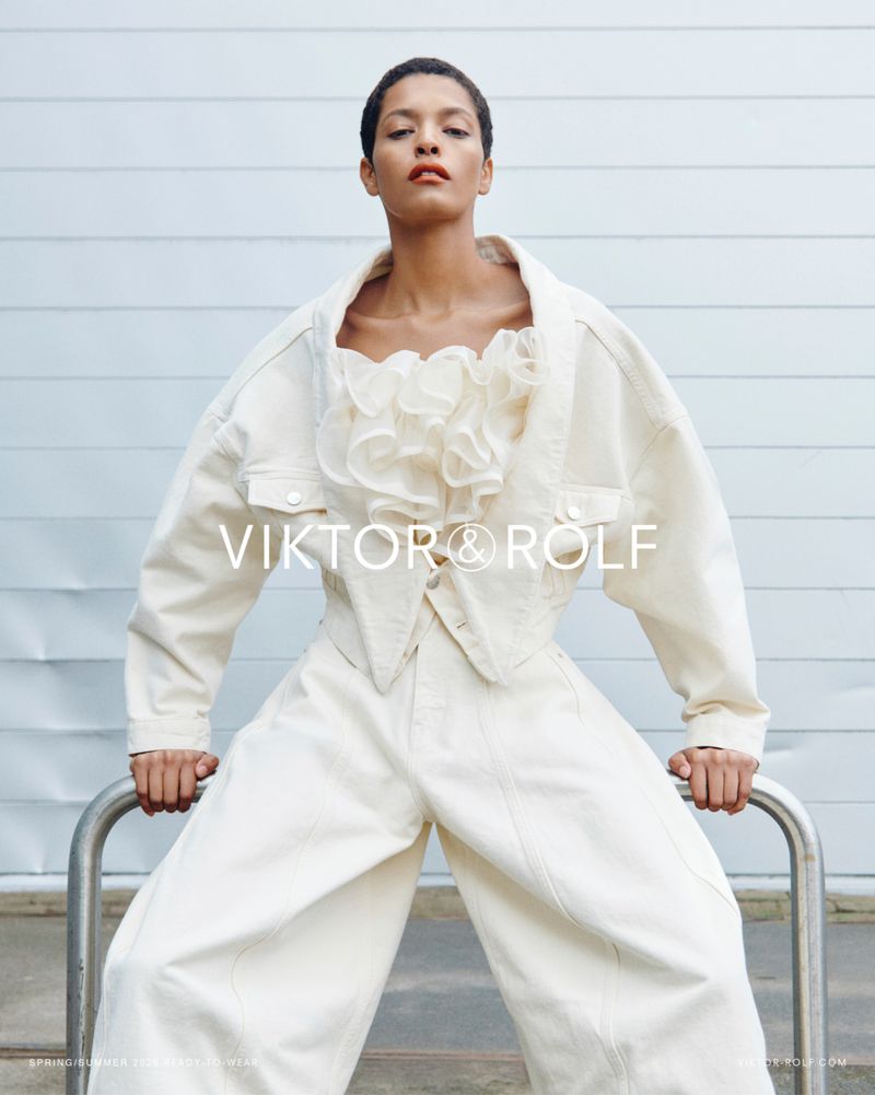 Model Laiza de Moura wearing an off-white ruffled top and matching denim jacket and wide-leg trousers for Viktor and Rolf.