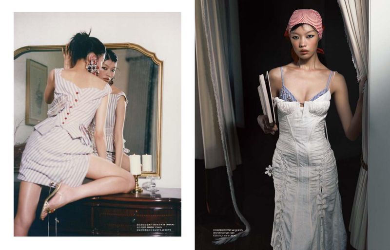 Fashion spread featuring model Tang He in a striped peplum set before a mirror and in a white corset dress with a red headscarf.