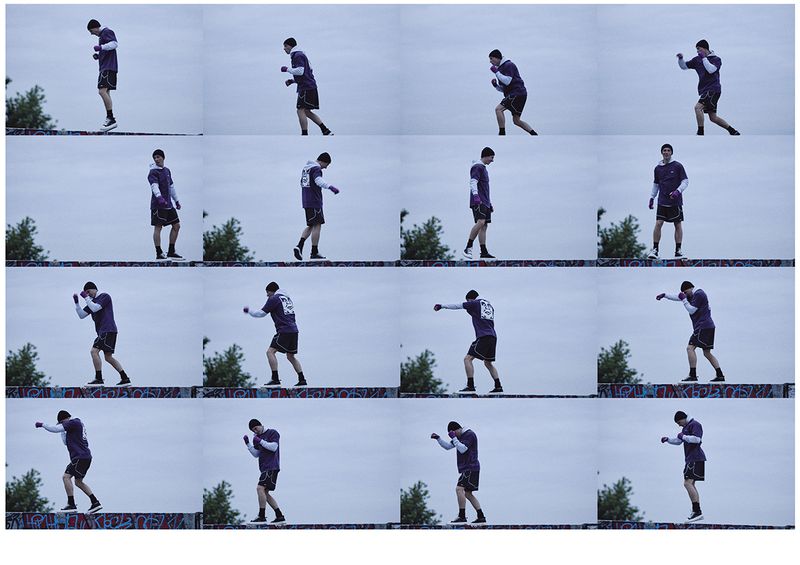 Contact sheet sequence of a man in athletic wear and a purple t-shirt shadowboxing on a ledge against an overcast sky.