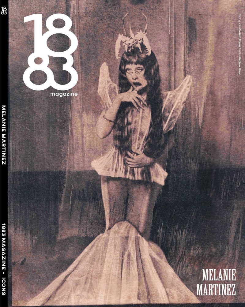 Melanie Martinez on 1883 Magazine cover wearing avant-garde fairy costume with horns and ruffled peplum top