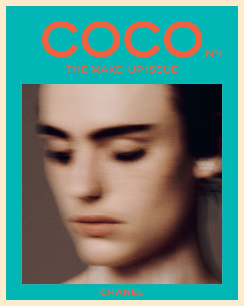 Magazine cover for Coco Issue 1 featuring a blurred soft focus beauty portrait of a woman framed in turquoise with bold orange text.