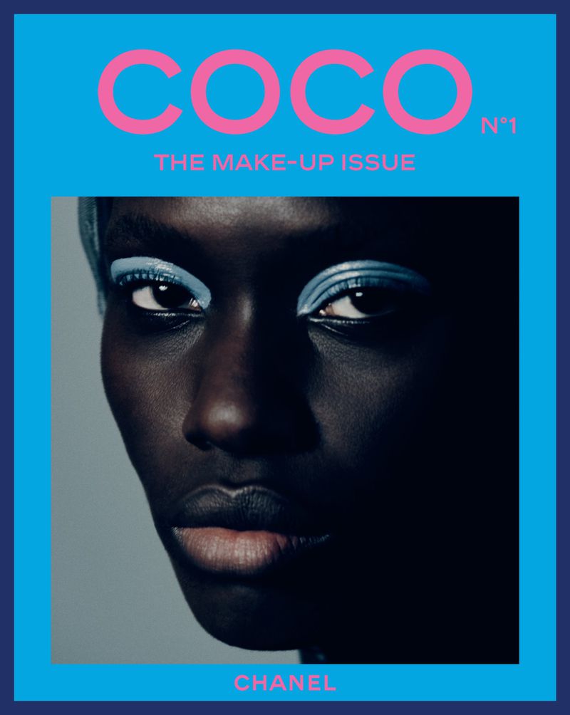 Close-up portrait of a model with blue eye makeup featured on Chanel Coco Magazine Issue No. 1 cover.