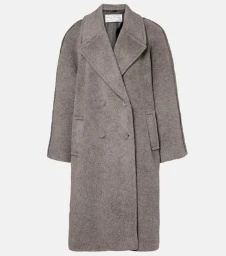Oversized double-breasted grey wool coat with wide notched lapels displayed against a seamless studio background.