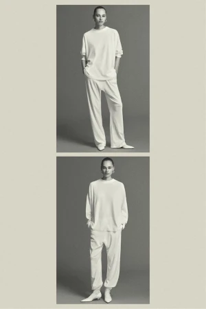 Two images of a woman posing in an all-white, long-sleeved top and pants in a photo studio setting with gray background.