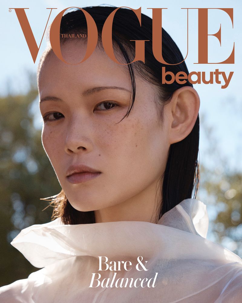 Model Xie Chaoyu wearing a sheer white high-neck garment on the Vogue Thailand Beauty cover.