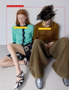 Two fashion models seated on the floor in knitwear and wide-leg trousers against a neutral studio backdrop with graphic UI overlays.