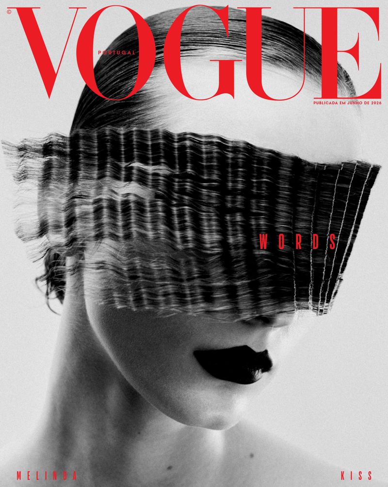 Melinda Kiss on the cover of Vogue Portugal with pleated fringe over her eyes and dark lipstick in black and white.