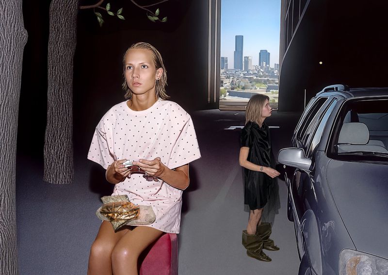 A woman in a dotted gown sits with food, while another stands by a car with city buildings and tree trunks visible in the background.