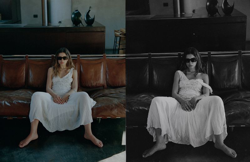 Side-by-side diptych of a woman in a white dress and black sunglasses sitting barefoot on a leather sofa in a modern interior.