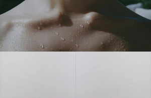 Close-up of wet skin and collarbones covered in water droplets on the top half of an editorial page spread.