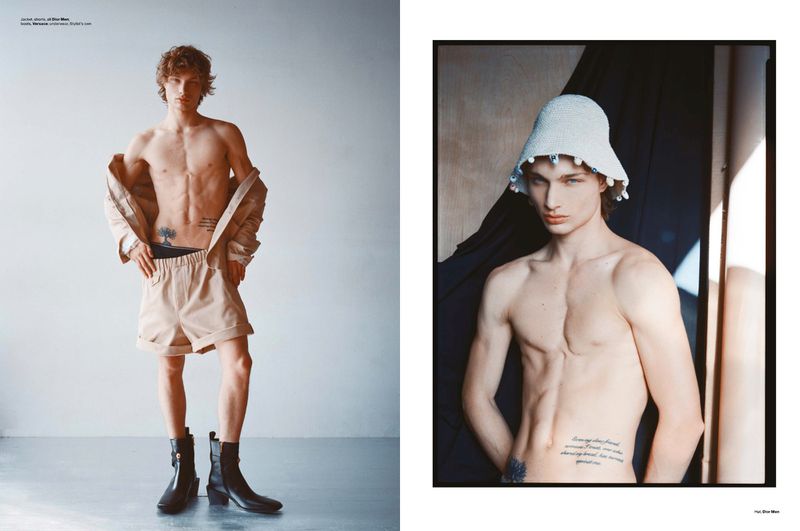 Fashion editorial of a shirtless male model in beige shorts, black boots, and a jacket; a second image shows him wearing a knitted hat.