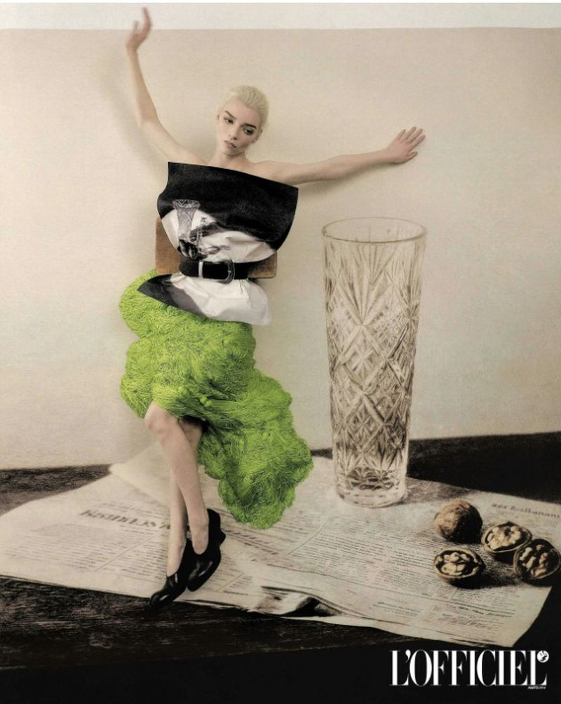 Anya Taylor-Joy in a structured top and textured green skirt posing beside a crystal vase and walnuts for L'Officiel Italia.