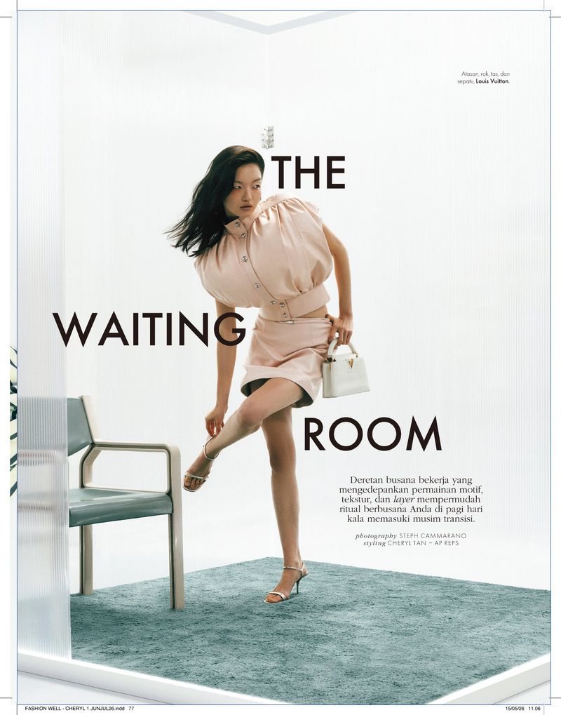 Model Shinyu Pan in a structured pale blush outfit posing on a green rug in a minimalist studio set for Elle Indonesia.
