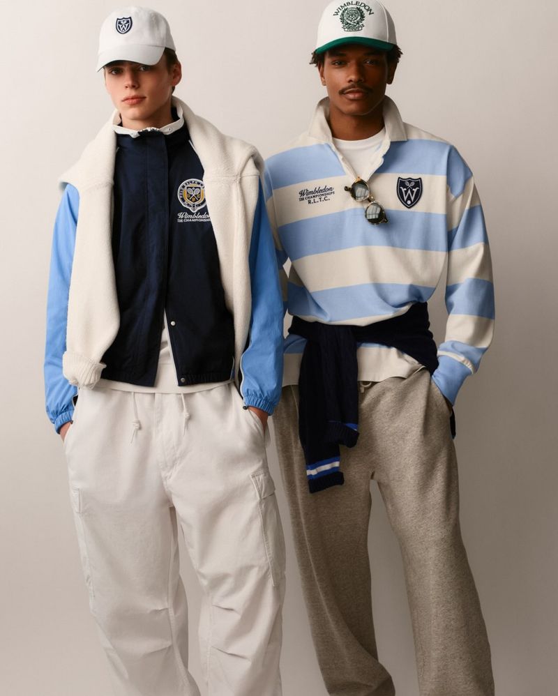 Two male models in tennis apparel and baseball caps standing against a plain white background for Polo Ralph Lauren.