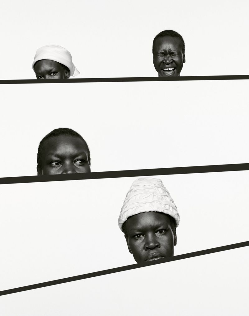 Black and white portrait composition of Alek Wek showing four distinct facial expressions framed by diagonal black stripes.