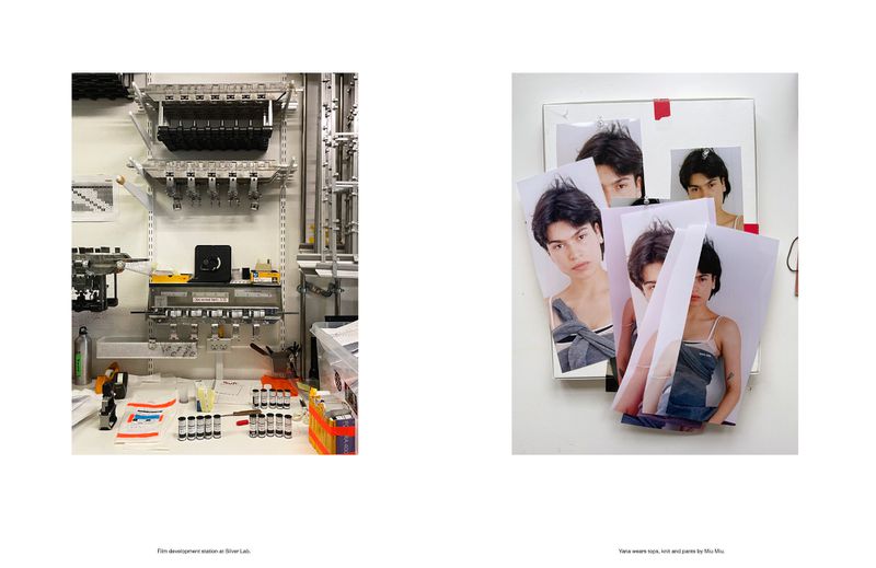 Film development lab with industrial equipment for processing film and a collection of portrait prints in a bright, minimalist setting.