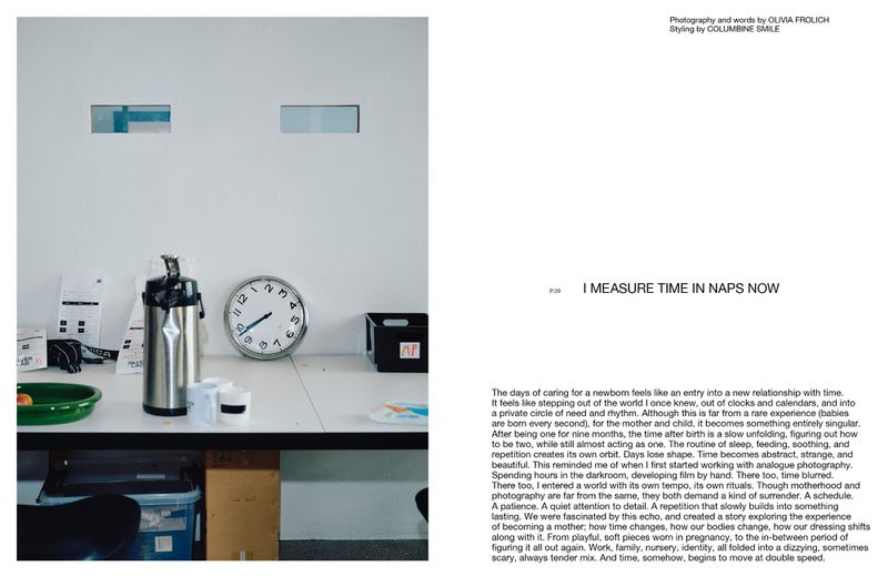 Still life photo of an analog clock, stainless steel thermos, and containers on a white table, capturing a quiet, minimalist aesthetic.
