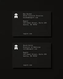 Two black business cards with white monospace typography and a geometric logo for Rugiet against a dark background.
