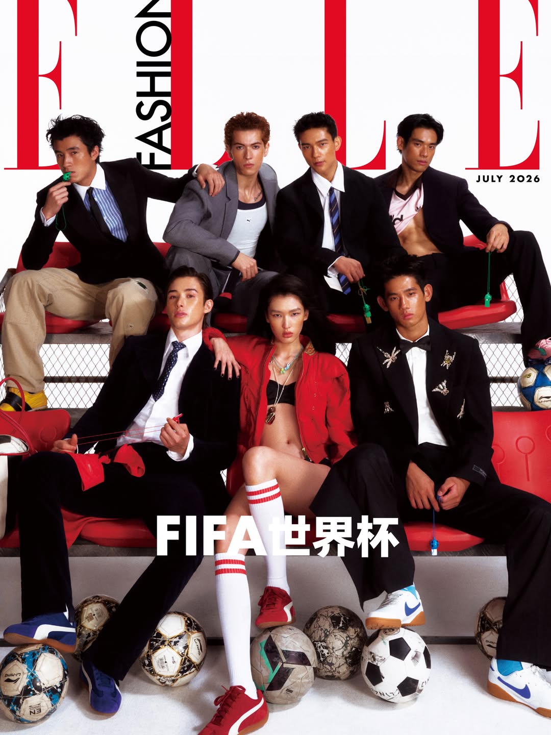 Group of seven models posing with soccer balls on red tiered stadium seats for an Elle China fashion editorial.