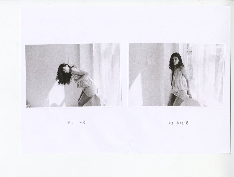 Contact sheet featuring two black-and-white photos of Kylie Jenner posing in a light sleeveless mini dress near a window.