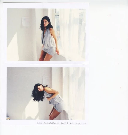 Kylie Jenner wearing a draped grey minidress posing beside a bright window with sheer curtains in two stacked test prints.
