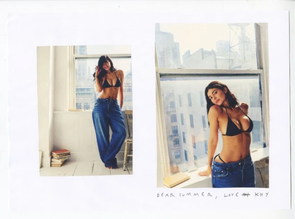 Kylie Jenner in a black bikini top and baggy blue jeans near a window for Khy Summer 2026